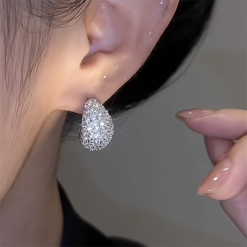 Boucle d’oreille QUEEN