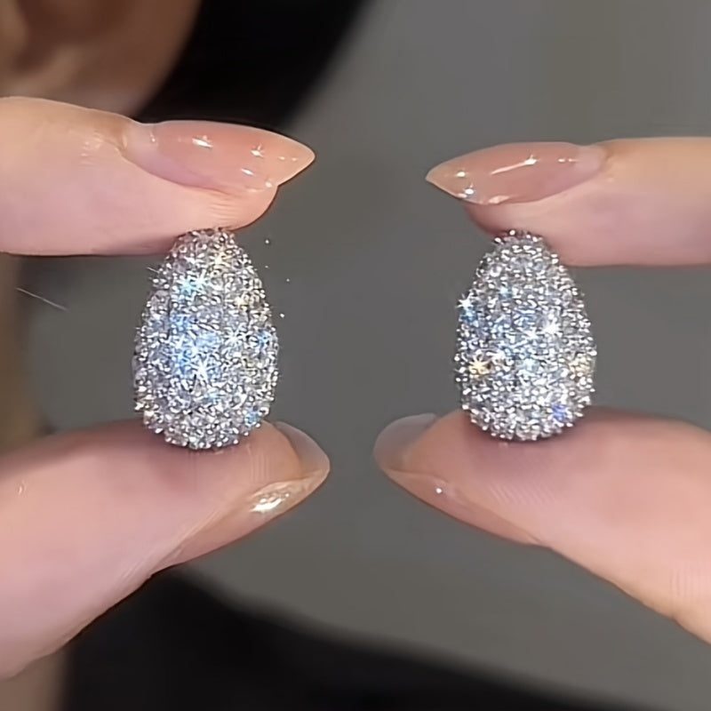 Boucle d’oreille QUEEN