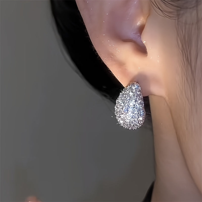 Boucle d’oreille QUEEN